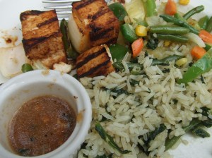 The piece de resistance, the tofu secuwa, which is grilled tofu and green peppers and onions on skewers, served with an amazingly tasty tamarind sauce, spinach ride and a green bean mixture (it looks way prettier when I haven't eaten half of it before photographing it)