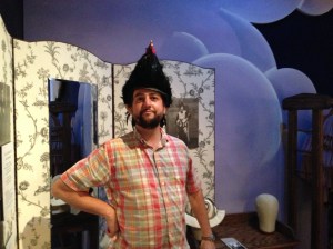 Aaron wearing a replica of Alfred's rooster hat.